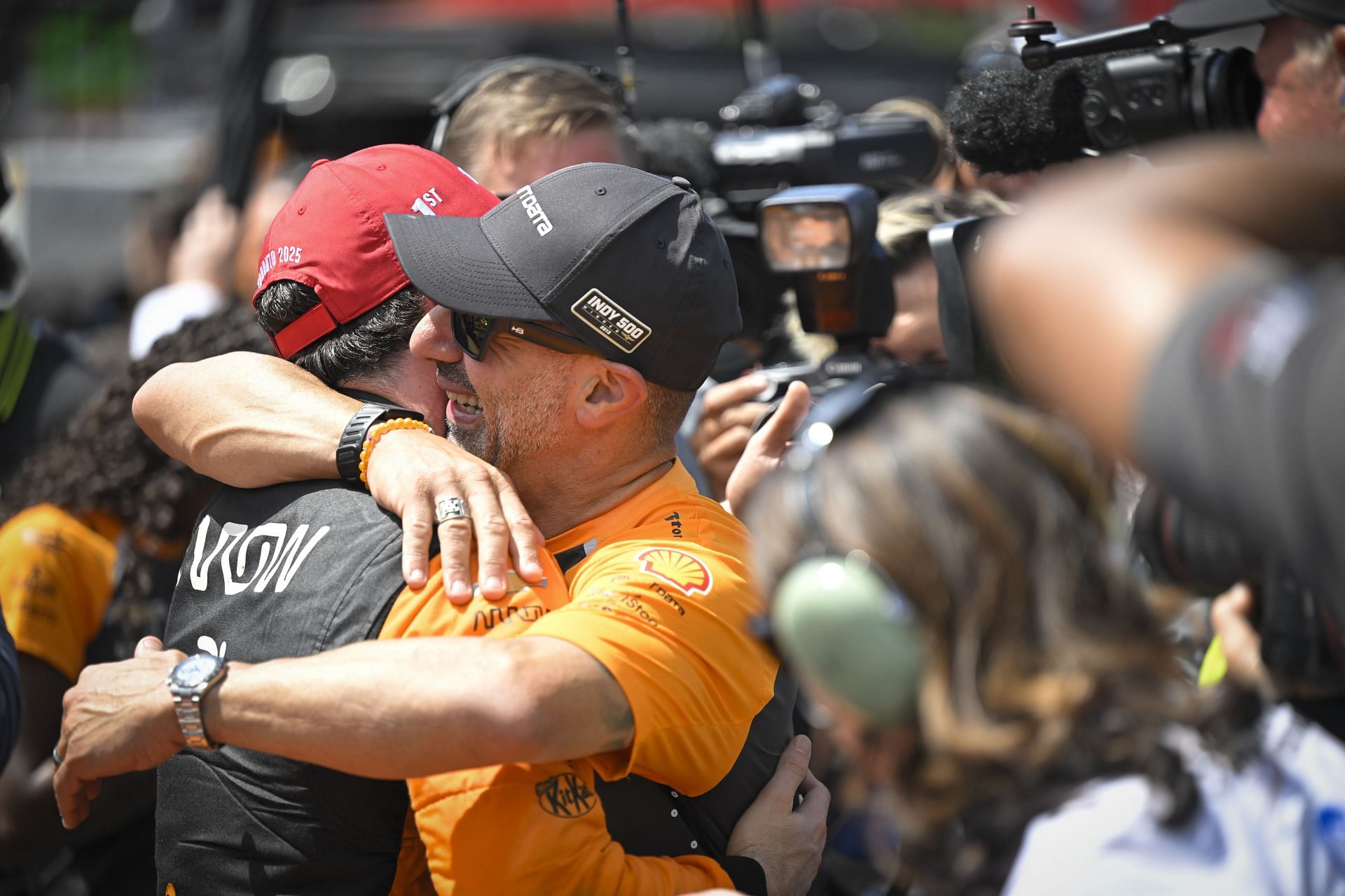Pato O'Ward hugging Tony Kanaan after winning the 2025 NTT INDYCAR Series Ontario Honda Dealers Indy Toronto - Source: Getty